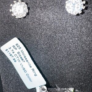 3.74 carat moissanite engagement ring and 4 carat moissanite earrings set.